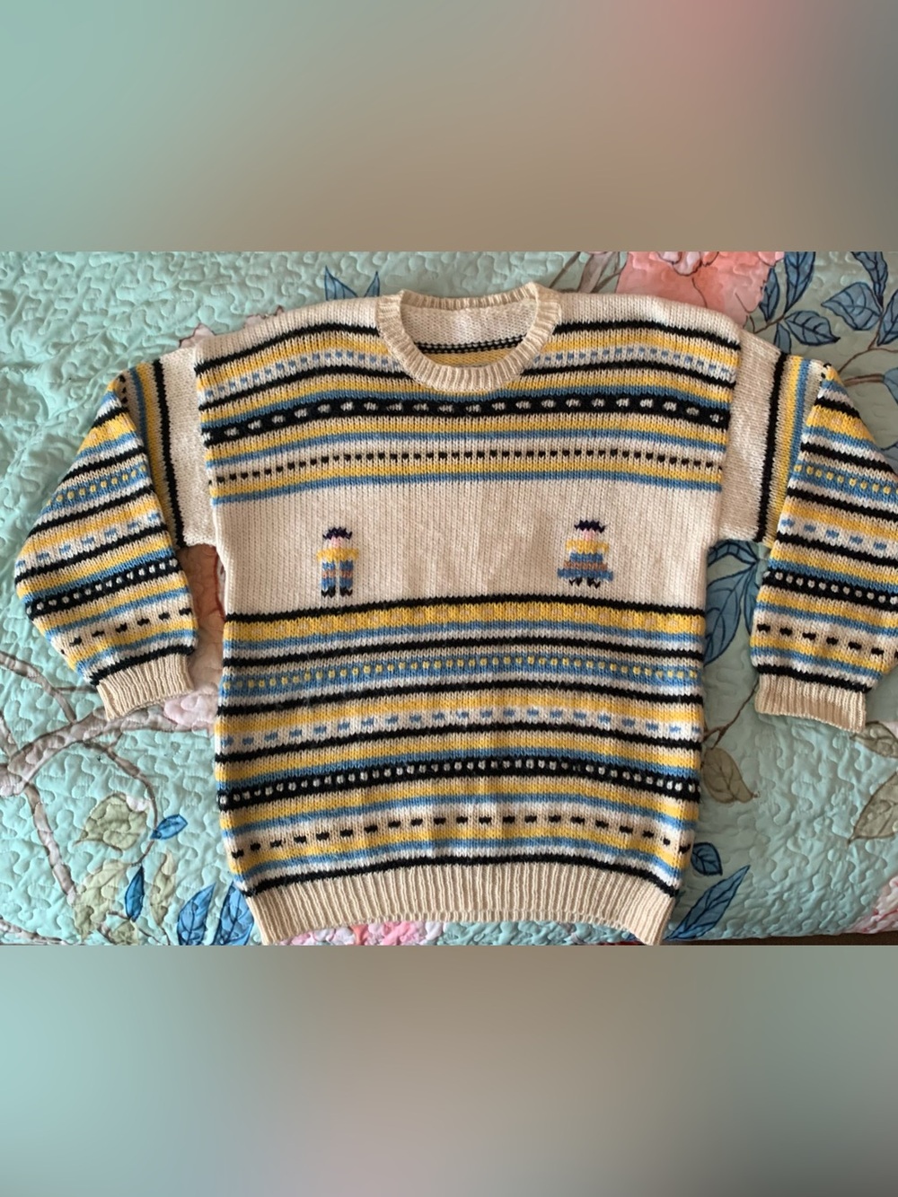 Handknit sweater.